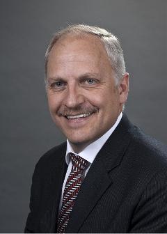 Greg Hill, President and COO